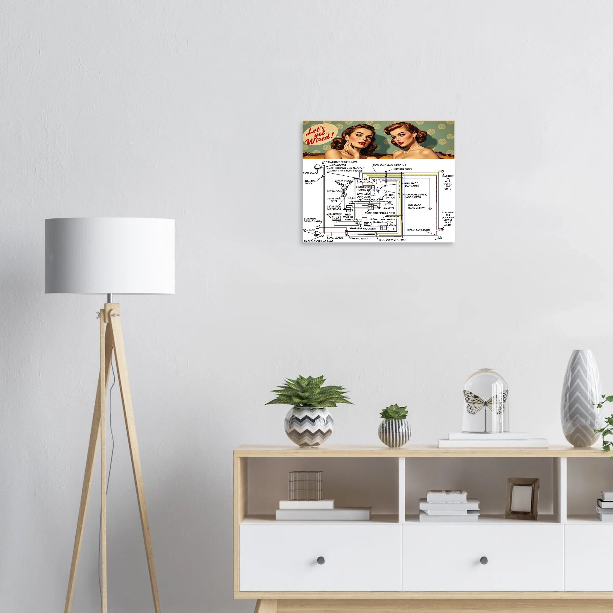 Framed PRINT LETS GET WIRED ORIGINAL WIRING SCHEMA & COLORS 1941-1945 TRUCKS displayed in modern living room, combining decor and vintage truck utility.