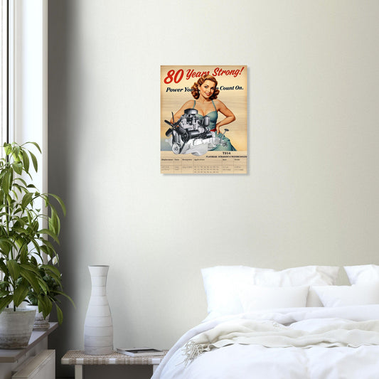 Brushed silver aluminum wall art of Flathead Straight-6 engine T214 in retro pin-up style, displayed above a bed in a modern bedroom.